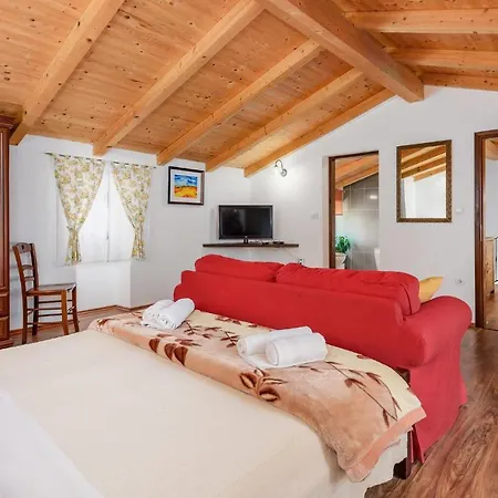 V Hébergement de vacances *